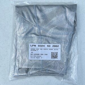 Brand new in bag Fabletics high waisted glitter hologram leggings. Size XS